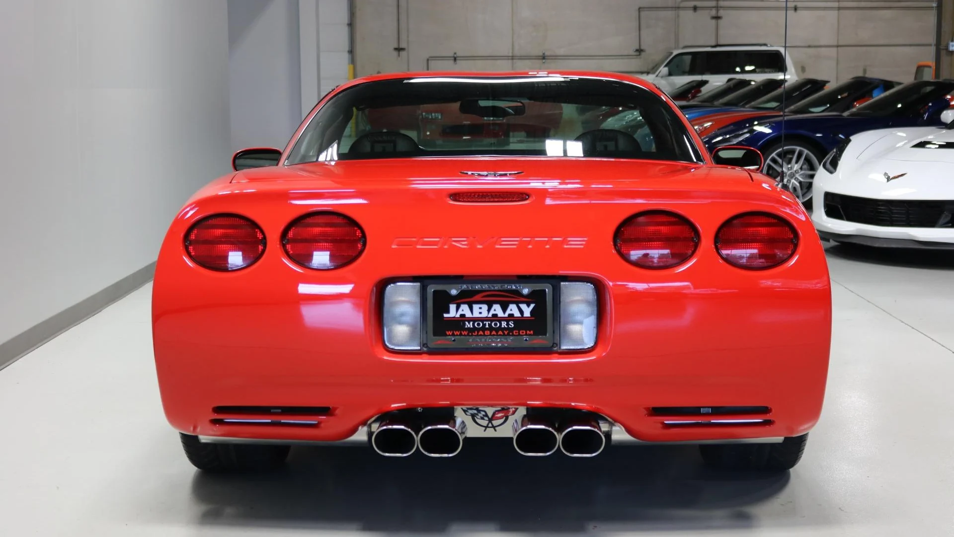 Click to Enlarge-Esc to Close Corvette Generations/C5/C5 1999 Red rear coupe.webp